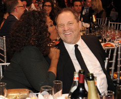 Oprah Winfrey kisses Harvey Weinstein