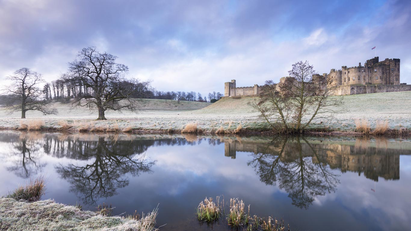 Alnwick Castle on a frosty winter morning in Northumberland, England